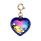 Colorful jewelry charm - heart with stardust in it