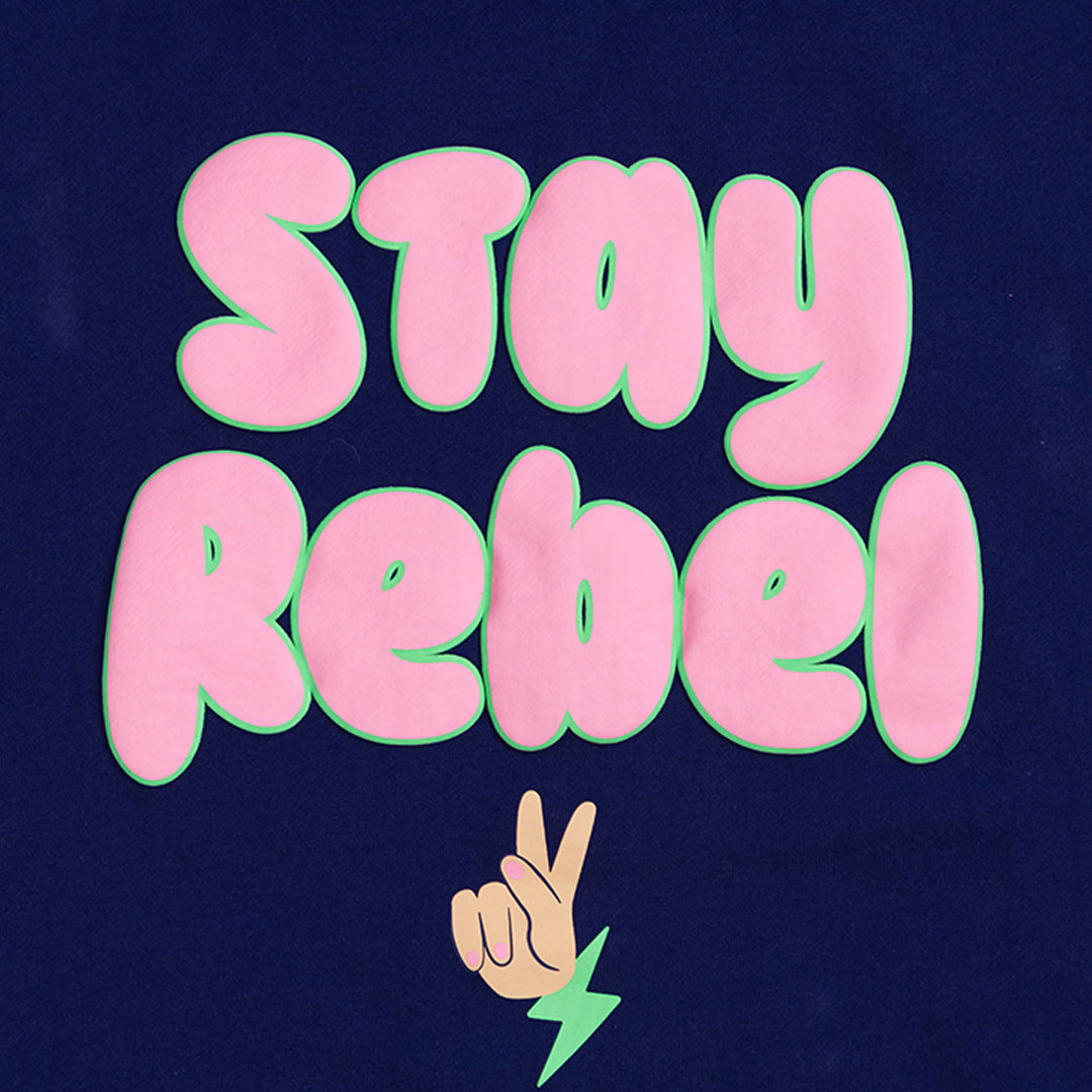 Navy blue cloth with "Stay Rebel" text in pink and green, with a cute peace sign